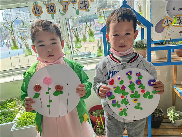 盱眙县盱城街道中心幼儿园开展"寻找春天"主题活动