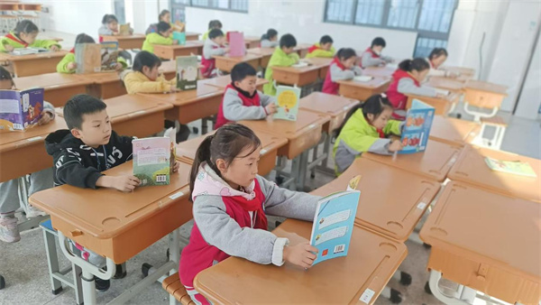 以书香滋养童心 让墨韵盈满校园——盱眙县实验小学“全民阅读春风行动”