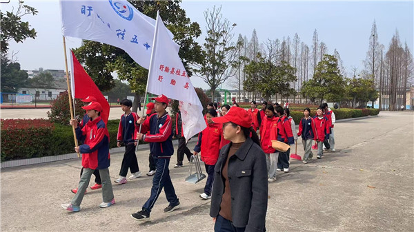 青春暖夕阳   爱心传美德——盱眙县桂五中学开展学雷锋志愿服务活动